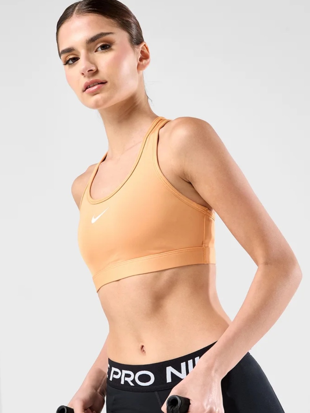 Nike Logo Medium Support Padded Sports Bra, Copper Moon, Small
